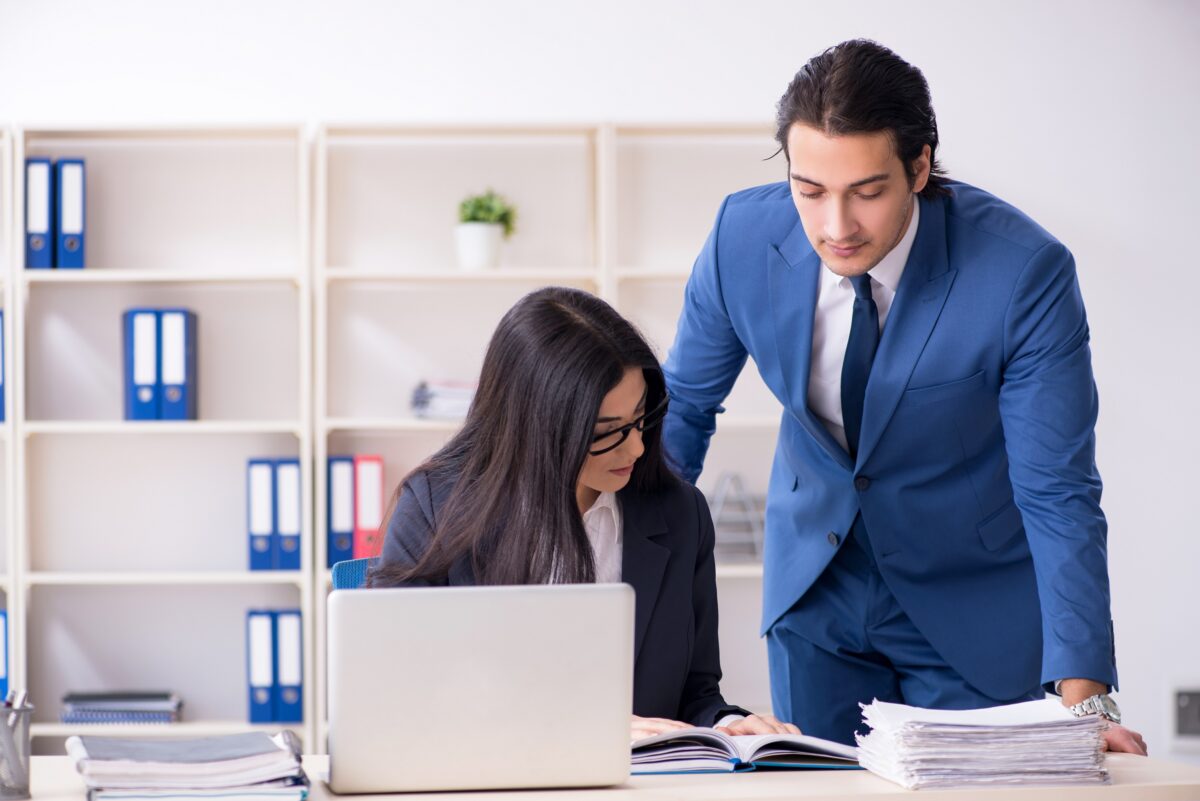 Two,Employees,Working,In,The,Office